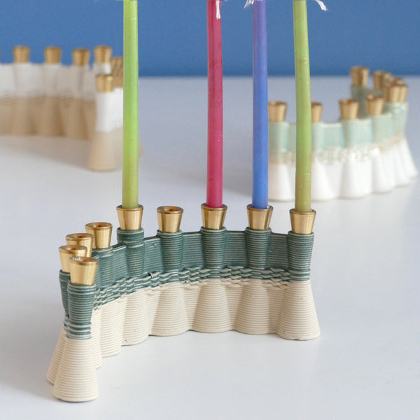 3D printed Clay Hanukkiah in its natural sand shade, Green glaze.  Brass canes carved in a local workshop exclusively for Armadillo Judaica.