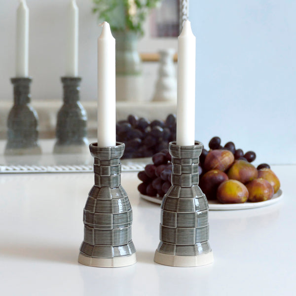 This Pair of Shabbat candlesticks designed in geometric modern Judaica style, manufactured in our studio in a unique method of clay 3D printing. With its geometric checkered pattern - these candleholders bring the newest design trend to your Shabbat evening table.