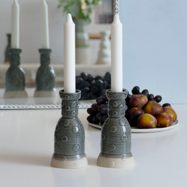 This Pair of Shabbat candlesticks designed in geometric modern Judaica style, manufactured in our studio in a unique method of clay 3D printing. With its geometric polka dots pattern - these candleholders bring the newest design trend to your Shabbat evening table.