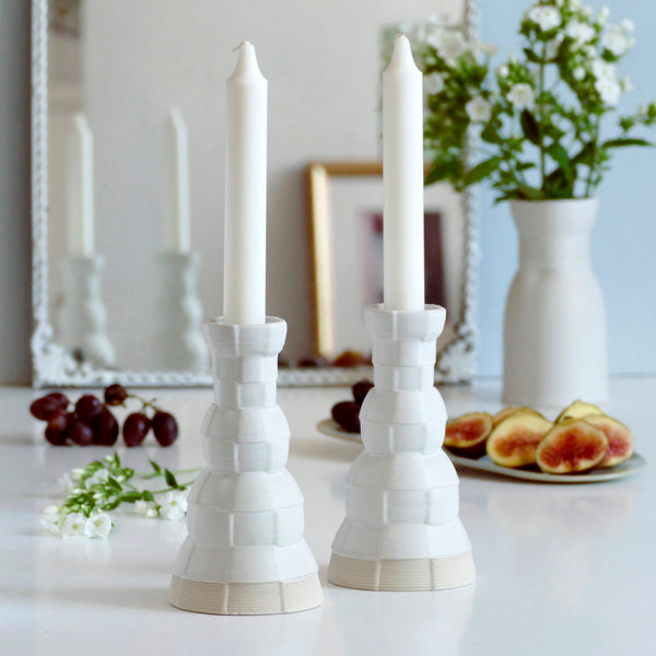 This Pair of Shabbat candlesticks designed in geometric modern Judaica style, manufactured in our studio in a unique method of clay 3D printing.