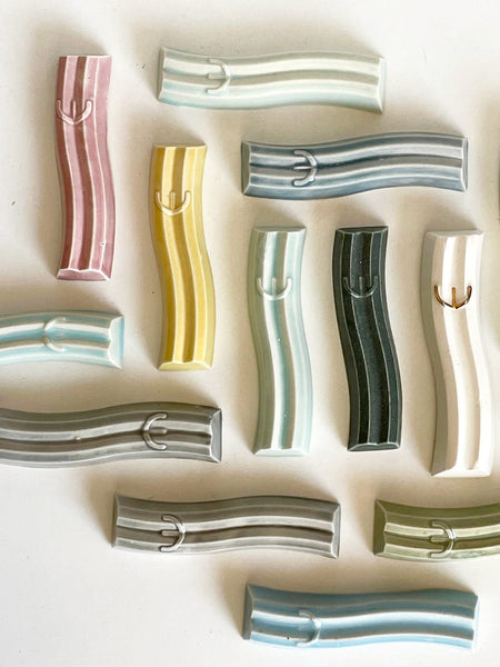 Mystery box of 3 Mezuzah cases, hand made of ceramic - wavy style.
The box includes three Mezuzah cases in the same design - the glazes combination is a surprise - three different colors - in attractive discount of 50%.