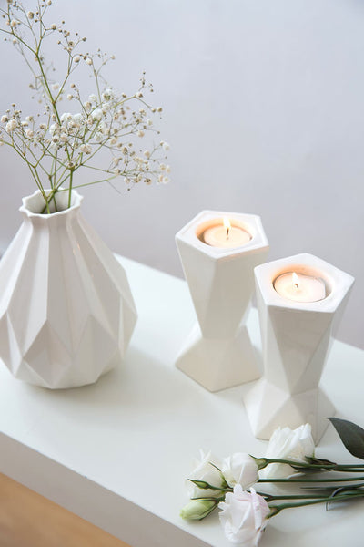 These two sided candle holders fits tall celebrative Shabbat candles on one side (as seen at picture #1), and flat romantic candles when you turn them upside down