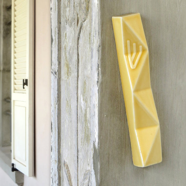 A modern Mezuzah case in contemporary geometric Judaica style. This Larger Mezuzah case will fit your front door, and will make an elegant entrance to your home