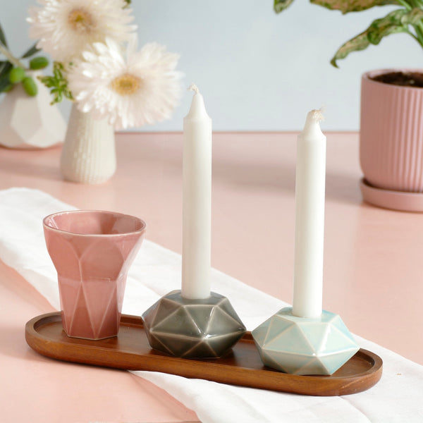 Mystery box of Shabbat table set, includes a Hexagon shaped Kiddush cup and pair of hexagon candlesticks, with matching bamboo tray.
The items that make up each set are fixed - the glazes combination varies from a range of pastel colors, off-white and gray.
Pictures show different combinations of glazes - the exact colors combination of your set is a surprise.
The items in this listing - are color sample or glazes tests - and may have minor faults in glaze finish. The items' shape and function are just fin