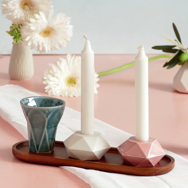 Mystery box of Shabbat table set, includes a Hexagon shaped Kiddush cup and pair of hexagon candlesticks, with matching bamboo tray.
The items that make up each set are fixed - the glazes combination varies from a range of pastel colors, off-white and gray.
Pictures show different combinations of glazes - the exact colors combination of your set is a surprise.