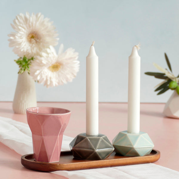 Mystery box of Shabbat table set, includes a Hexagon shaped Kiddush cup and pair of hexagon candlesticks, with matching bamboo tray.
The items that make up each set are fixed - the glazes combination varies from a range of pastel colors, off-white and gray.
Pictures show different combinations of glazes - the exact colors combination of your set is a surprise.
The items in this listing - are color sample or glazes tests - and may have minor faults in glaze finish. The items' shape and function are just fin