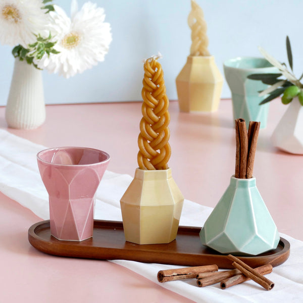 Mystery box of Havdalah set, consist of all items needed for a Havdalah weekly ritual - a wine cup, a candleholder and Besamim holder - all made of molded clay. A matching bamboo tray - is an addition to this set to hold all set parts together.
The parts of this set are fixed - the glazes combination varies from a range of pastel colors, off-white and gray.