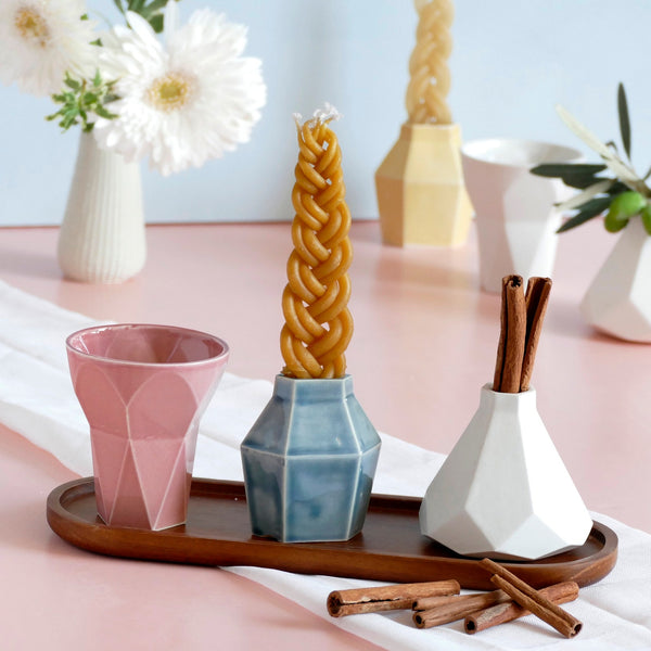 Mystery box of Havdalah set, consist of all items needed for a Havdalah weekly ritual - a wine cup, a candleholder and Besamim holder - all made of molded clay. A matching bamboo tray - is an addition to this set to hold all set parts together.
The parts of this set are fixed - the glazes combination varies from a range of pastel colors, off-white and gray.