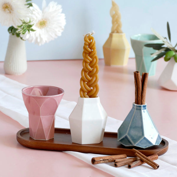 Mystery box of Havdalah set, consist of all items needed for a Havdalah weekly ritual - a wine cup, a candleholder and Besamim holder - all made of molded clay. A matching bamboo tray - is an addition to this set to hold all set parts together.
The parts of this set are fixed - the glazes combination varies from a range of pastel colors, off-white and gray.
