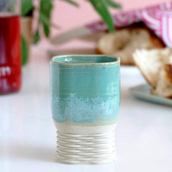 This elegant Kiddush wine goblet has a square shape and weaving pattern on its leg - created in a unique method by a clay 3D Printer.