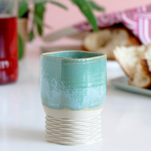 This elegant Kiddush wine goblet has a square shape and weaving pattern on its leg - created in a unique method by a clay 3D Printer.