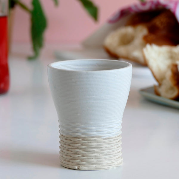 This elegant Shabbat Table set includes a wine goblet and a matching pair of candlesticks, rounded square shape, with weaving pattern - created in a unique method by a clay 3D Printer.