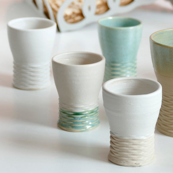 Mystery box of Kiddush cups set - The box's contents stay the same - the glazes varies in Beige Mint and Off- White. Pictures show different combinations of glazes - the exact colors combination of your set is a surprise.