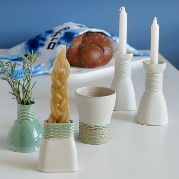 All you need to celebrate Shabbat - in one Mystery box Kiddush cup and a pair of candlesticks - to celebrate the beginning of Shabbat, and an addition of Besamim holder and Havdalah candle holder - for the Havdalah ceremony - together with the same wine cup.