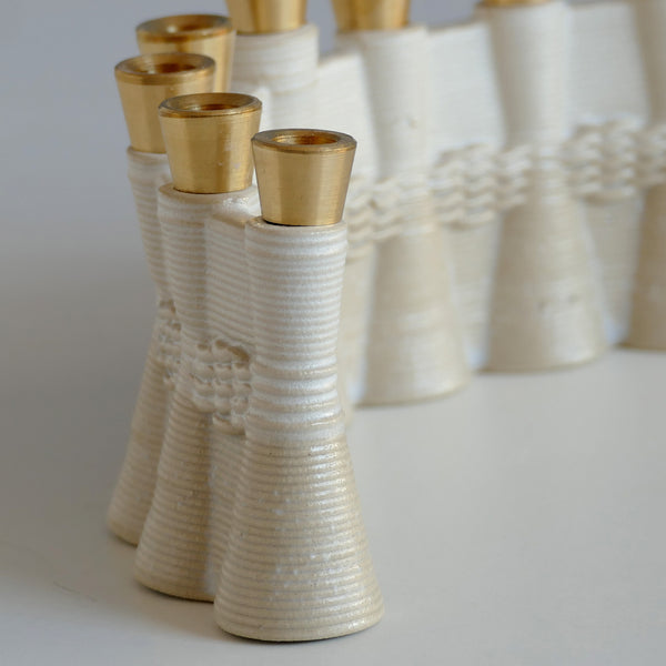 3D printed Clay Hanukkah Menorah, Off - White and beige.  Brass canes carved in a local workshop exclusively for Armadillo Judaica. חנוכיה מקרמיקה בהדפסת תלת מימד, עיצוב ישראלי עכשוי, מיוצרת בסדרות קטנות בעסק קטן בתל אביב