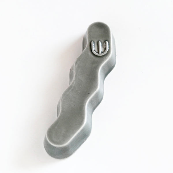 Original Mezuzah case design - clean geometric lines, pop Zig Zag shape, molded in clay, sealed in grey glaze. Inspired by pop art, and 80's style, this is a minimalist sophisticated addition to your home entrance and indoor openings.