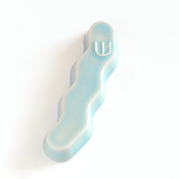 Original Mezuzah case design - clean geometric lines, pop Zig Zag shape, molded in clay, sealed in light blue glaze. Inspired by pop art, and 80's style, this is a minimalist sophisticated addition to your home entrance and indoor openings.