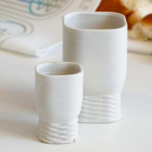 elegant Kiddush cups set has clean square shape with weaving pattern at its bottom - created in a unique method by a clay 3D Printer.