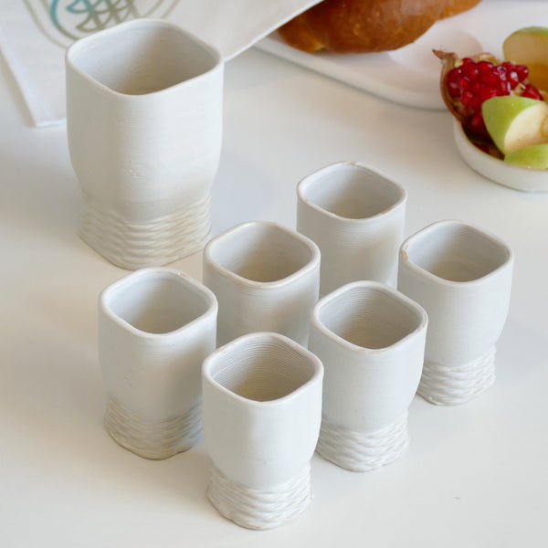 modern white ceramic Kiddush cup - made in Israel in 3d clay printer - weaving texture details make it look like a jewel