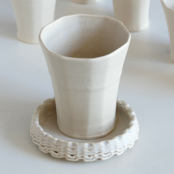 This elegant Kiddush set includes a wine goblet and a matching plate, designed in polygon shape - created in a unique method by a clay 3D Printer.