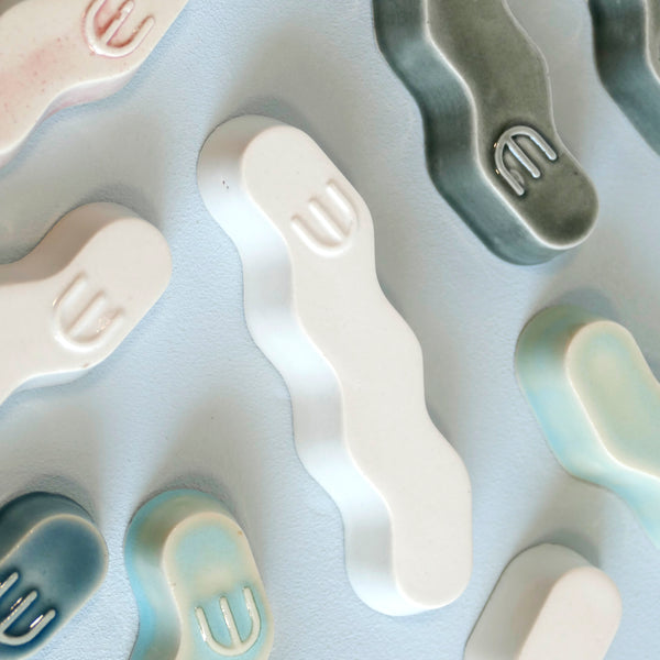 Original Mezuzah case design - clean geometric lines, pop Zig Zag shape, molded in clay, sealed in off-white glaze. Inspired by pop art, and 80's style, this is a minimalist sophisticated addition to your home entrance and indoor openings.