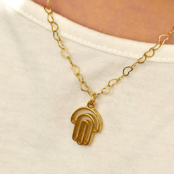 Gold Hamsa By Armadillo Judaica