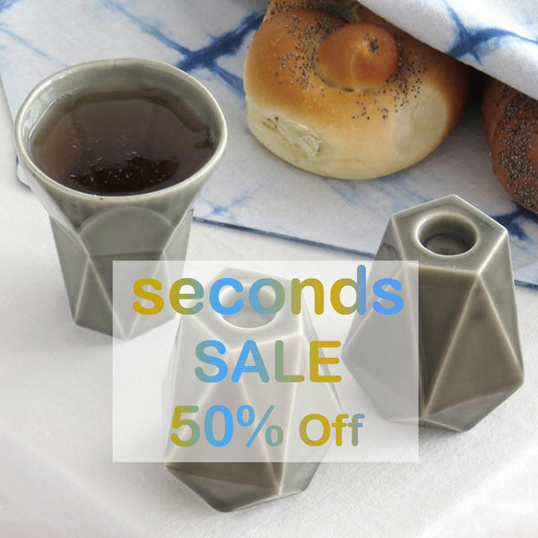 a set of geometric modern Judaica: Kiddush cup + Pair of geometric candlesticks designed in minimalist style,
