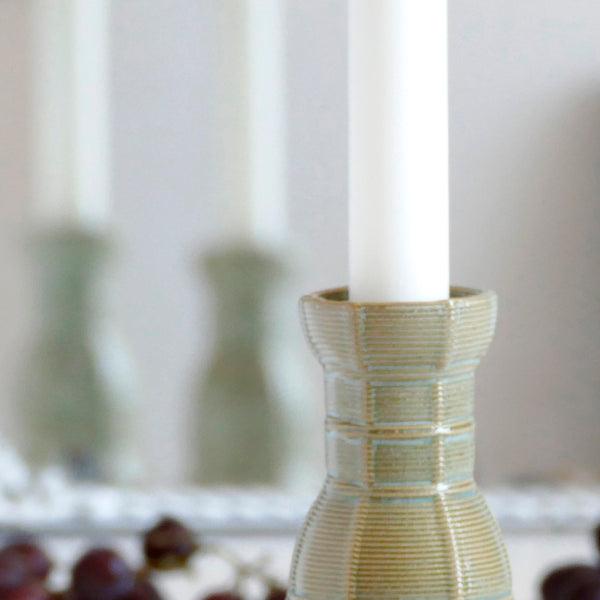 An innovative Shabbat table set, with Pair of candlesticks and Kiddush cup. Designed in geometric modern Judaica style, manufactured in our studio in a unique method of clay 3D printing.