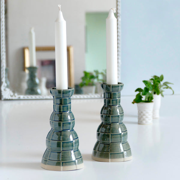 This Pair of Shabbat candlesticks designed in geometric modern Judaica style, manufactured in our studio in a unique method of clay 3D printing.