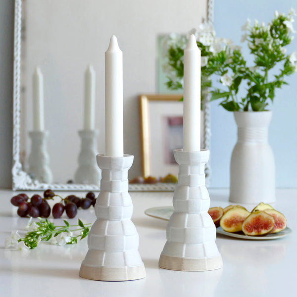 This Pair of Shabbat candlesticks designed in geometric modern Judaica style, manufactured in our studio in a unique method of clay 3D printing.