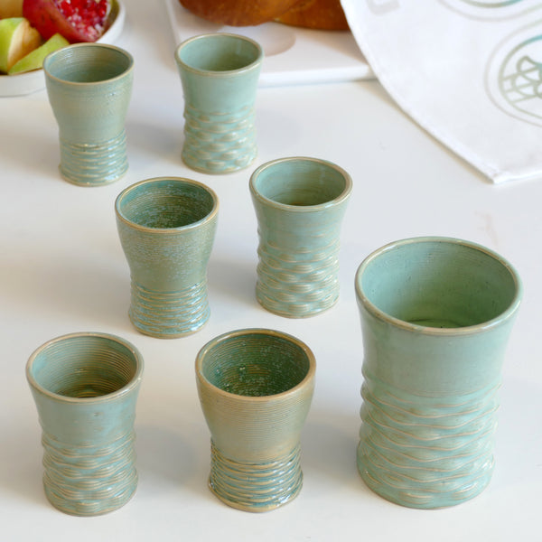 modern Kiddush cups 3D printed Clay in its natural sand shade. Mint glaze.