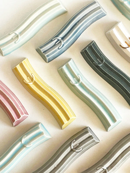 Mystery box of 3 Mezuzah cases, hand made of ceramic - wavy style.
The box includes three Mezuzah cases in the same design - the glazes combination is a surprise - three different colors - in attractive discount of 50%.