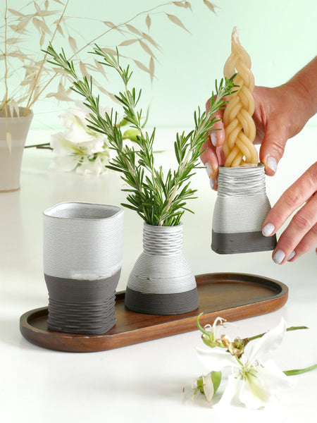 This elegant Havdalah set is created in a unique method by a clay 3D Printer.
It consists of all items needed for a Havdalah weekly ritual: a wine cup, a candleholder, Besamim holder, and a matching bamboo plate.