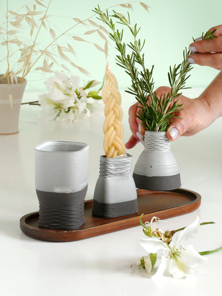 This elegant Havdalah set is created in a unique method by a clay 3D Printer.
It consists of all items needed for a Havdalah weekly ritual: a wine cup, a candleholder, Besamim holder, and a matching bamboo plate.