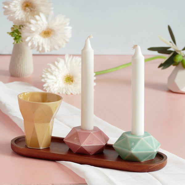 Mystery box of Shabbat table set, includes a Hexagon shaped Kiddush cup and pair of hexagon candlesticks, with matching bamboo tray.
The items that make up each set are fixed - the glazes combination varies from a range of pastel colors, off-white and gray.
Pictures show different combinations of glazes - the exact colors combination of your set is a surprise.

The items in this listing - are color sample or glazes tests - and may have minor faults in glaze finish. The items' shape and function are just fin