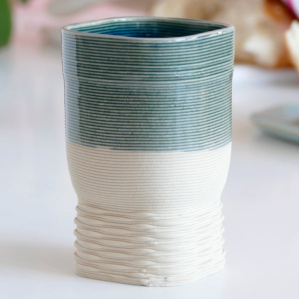 This Kiddush cup has a square shape and a gentle weaving pattern on its leg - created in a unique method by a clay 3D Printer. Enjoy now - for a limited time only - Early Bird Sale of 3D Printed Clay Kiddush cup.