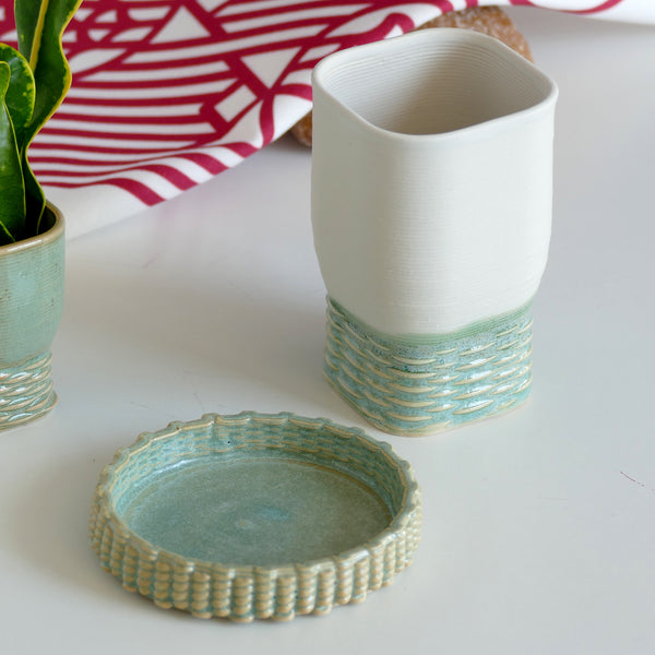 3D printed Ceramic in its natural ivory shade color. Mint glaze.
