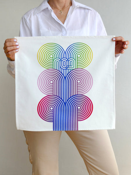 stylish and trendy set of a Matzah cover and Afikoman bag, crafted from fine off-white cotton. The design features an op-art-inspired wave pattern in stunning multicolor Ombre tones, printed using state-of-the-art 'Kornit Digital' textile printers. This design draws inspiration from the story of Exodus, merging tradition with contemporary aesthetic.