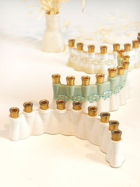 Hanukkah Mystery Box - Get two Clay 3D Printed Menorah Samples, pay for one.

Special Pre-Hanukkah Offer: A Design Journey Surprise!

A limited quantity is available, allowing you to own a piece of our innovative design journey! The development process for our new 3D printed clay Menorah left us with dozens of beautiful and functional samples. Their shapes and colors vary based on the trials we conducted.