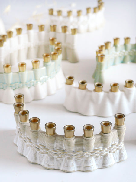 Hanukkah Mystery Box - Get two Clay 3D Printed Menorah Samples, pay for one.

Special Pre-Hanukkah Offer: A Design Journey Surprise!

A limited quantity is available, allowing you to own a piece of our innovative design journey! The development process for our new 3D printed clay Menorah left us with dozens of beautiful and functional samples. Their shapes and colors vary based on the trials we conducted.