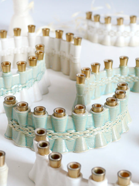 Hanukkah Mystery Box - Get two Clay 3D Printed Menorah Samples, pay for one.

Special Pre-Hanukkah Offer: A Design Journey Surprise!

A limited quantity is available, allowing you to own a piece of our innovative design journey! The development process for our new 3D printed clay Menorah left us with dozens of beautiful and functional samples. Their shapes and colors vary based on the trials we conducted.