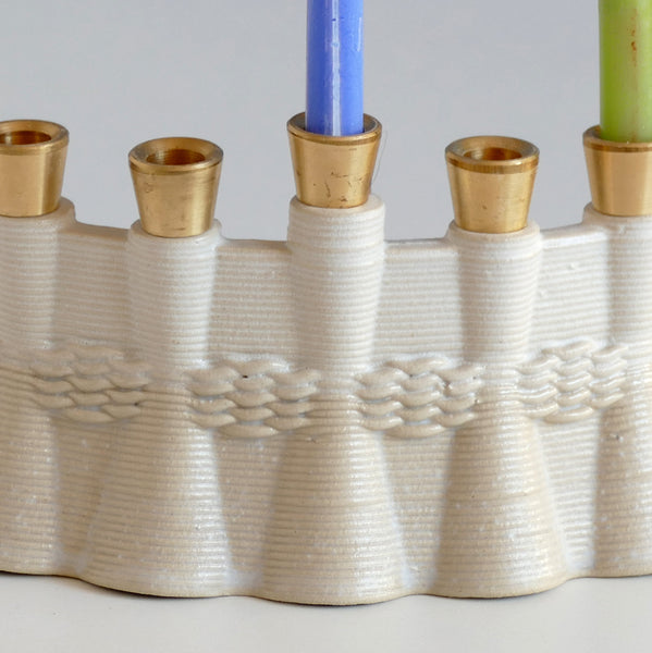 3D printed Clay Hanukkah Menorah, Off - White and beige.  Brass canes carved in a local workshop exclusively for Armadillo Judaica.