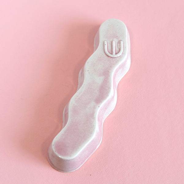 Original Mezuzah case design - clean geometric lines, pop Zig Zag shape, molded in clay, sealed in washed pink glaze.  Inspired by pop art, and 80's style, this is a minimalist sophisticated addition to your home entrance and indoor openings.