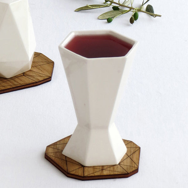 Geometric Kiddush cup designed in modern style. Perfect as a trendy Judaica gift, for father's day, wedding, Bar-Mitzva or any other Jewish celebration.