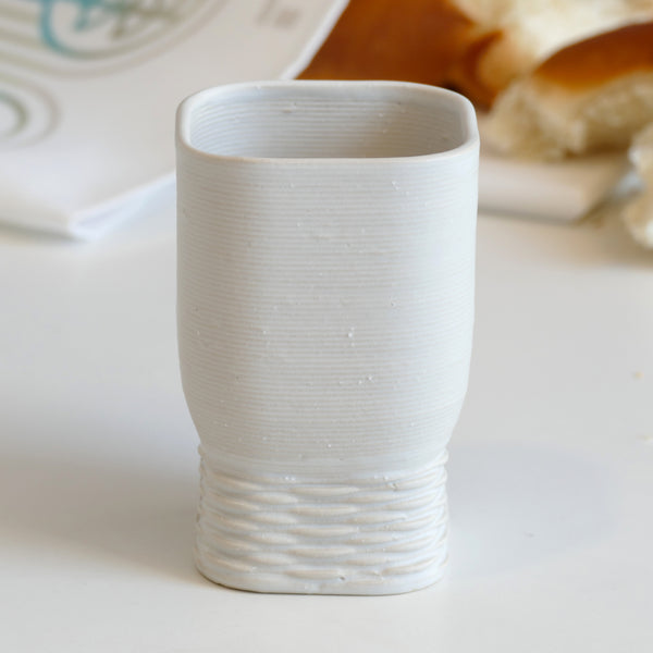 elegant Kiddush cups set has clean square shape with weaving pattern at its bottom - created in a unique method by a clay 3D Printer.