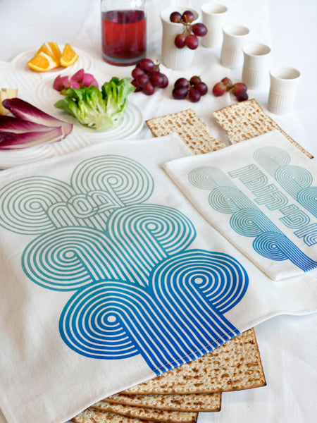 Whether you're looking to give your Passover table a modern twist or searching for the perfect gift for your Seder night host, this set is a timeless choice that will last for years to come.

This Seder set is part of our original Op Art collection, celebrating the magic of op-art in Judaica.