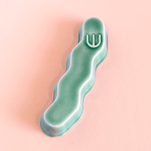 Original Mezuzah case design - clean geometric lines, pop Zig Zag shape, molded in clay, sealed in emerald green glaze.