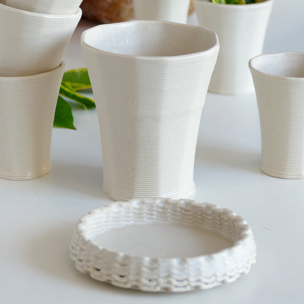 This elegant Kiddush set includes a wine goblet and a matching plate, designed in polygon shape - created in a unique method by a clay 3D Printer.