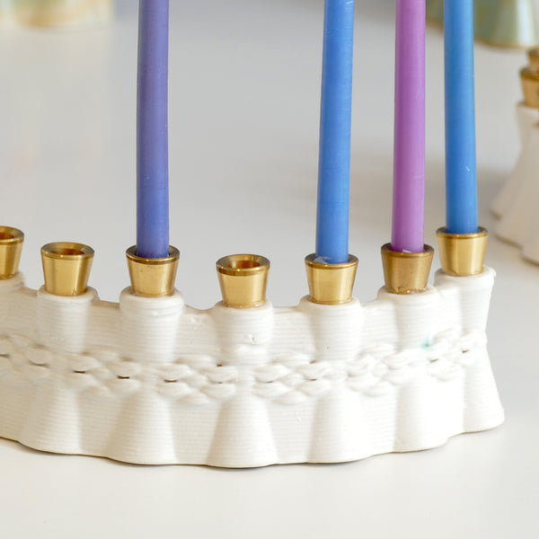 modern Hanukkah Menorah with weaving pattern created in 3D printer, ceramic and brass