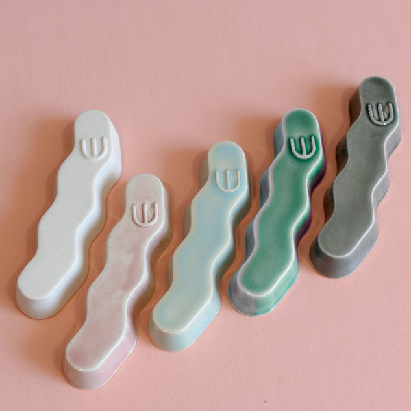 Original Mezuzah case design - clean geometric lines, pop Zig Zag shape, molded in clay, sealed in emerald green glaze.